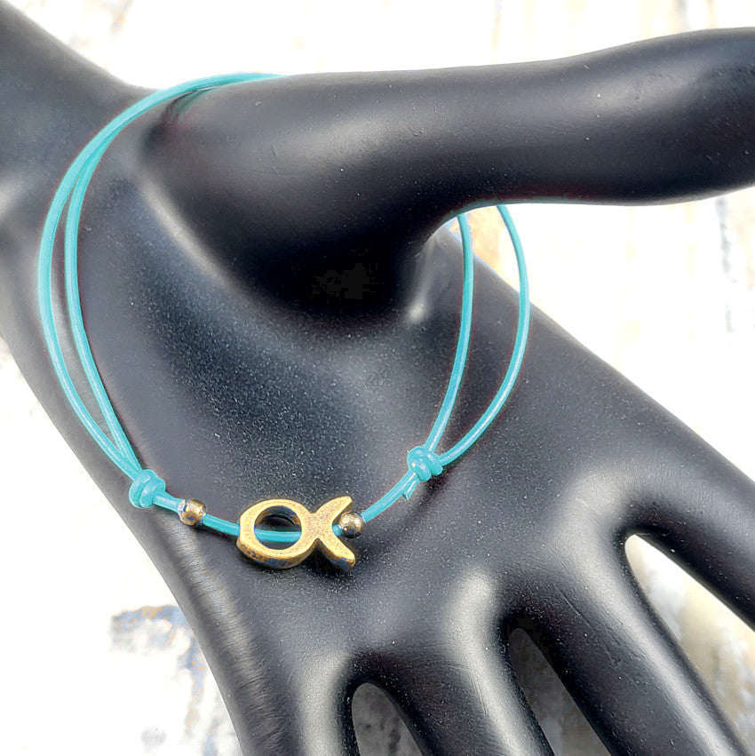 Armband aus Leder, türkis mit Fisch